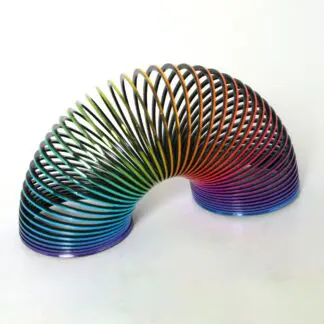 Rainbow plastic magic spring with a metallic finish, shown extended